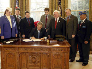 Bush sign HR 2297 into law, Dec. 16, 2003